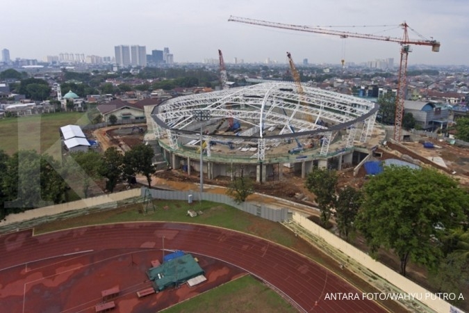 Foto aerial pembangunan arena balap sepeda (velodrome) di Rawamangun, Jakarta, Senin (9/10). Pembangunan velodrome yang dipersiapkan untuk Asian Games 2018 itu telah mencapai lebih dari 60 persen dan diperkirakan awal 2018 telah siap untuk diuji coba. ANTARA FOTO/Wahyu Putro A/ama/17