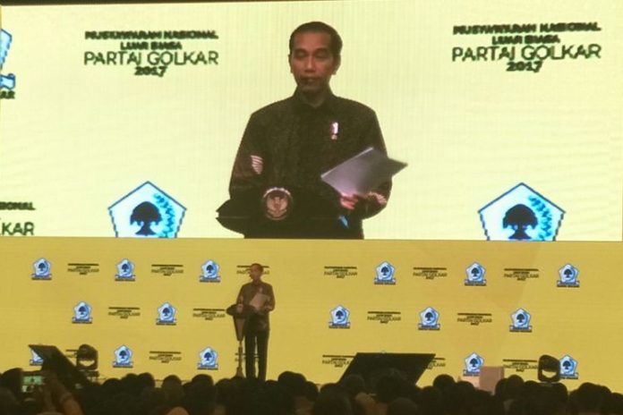 Presiden Jokowi di acara pembukaan Munaslub Golkar, Jakarta, Senin (18/12/2017)(Kompas.com/YOGA SUKMANA)